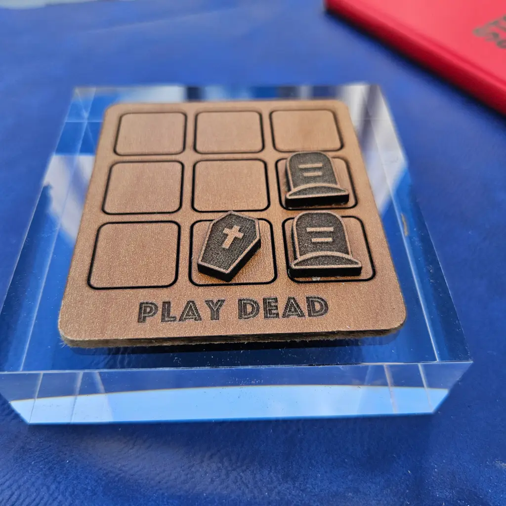 "Play Dead" Tic Tac Toe